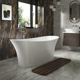 The Davenport stone freestanding bath in a modern bathroom with chrome freestanding bath taps.