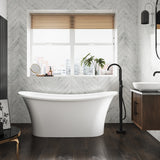The Goldsmith stone freestanding bath in a modern bathroom with matt black freestanding bath taps.